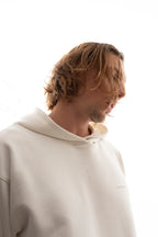 Hoodie Oversized Essentials · Blanco Hueso