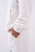 Hoodie Oversized Essentials · Blanco Hueso