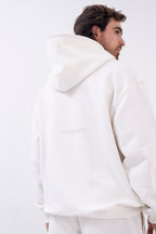 Hoodie Oversized Essentials · Blanco Hueso